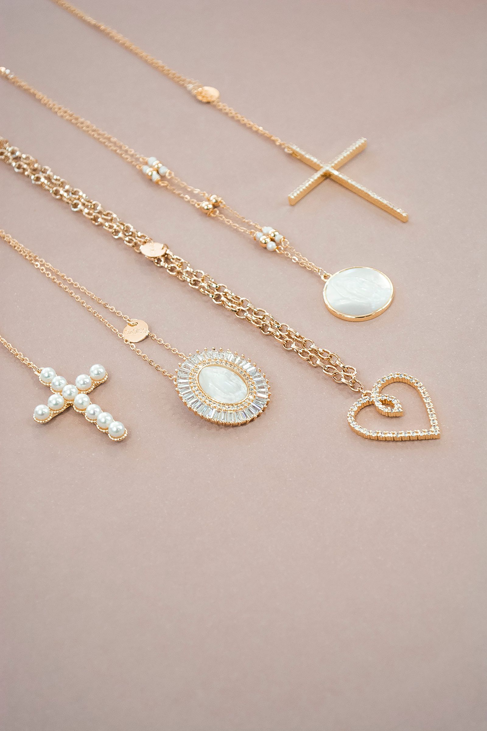 Gold necklaces and pendants