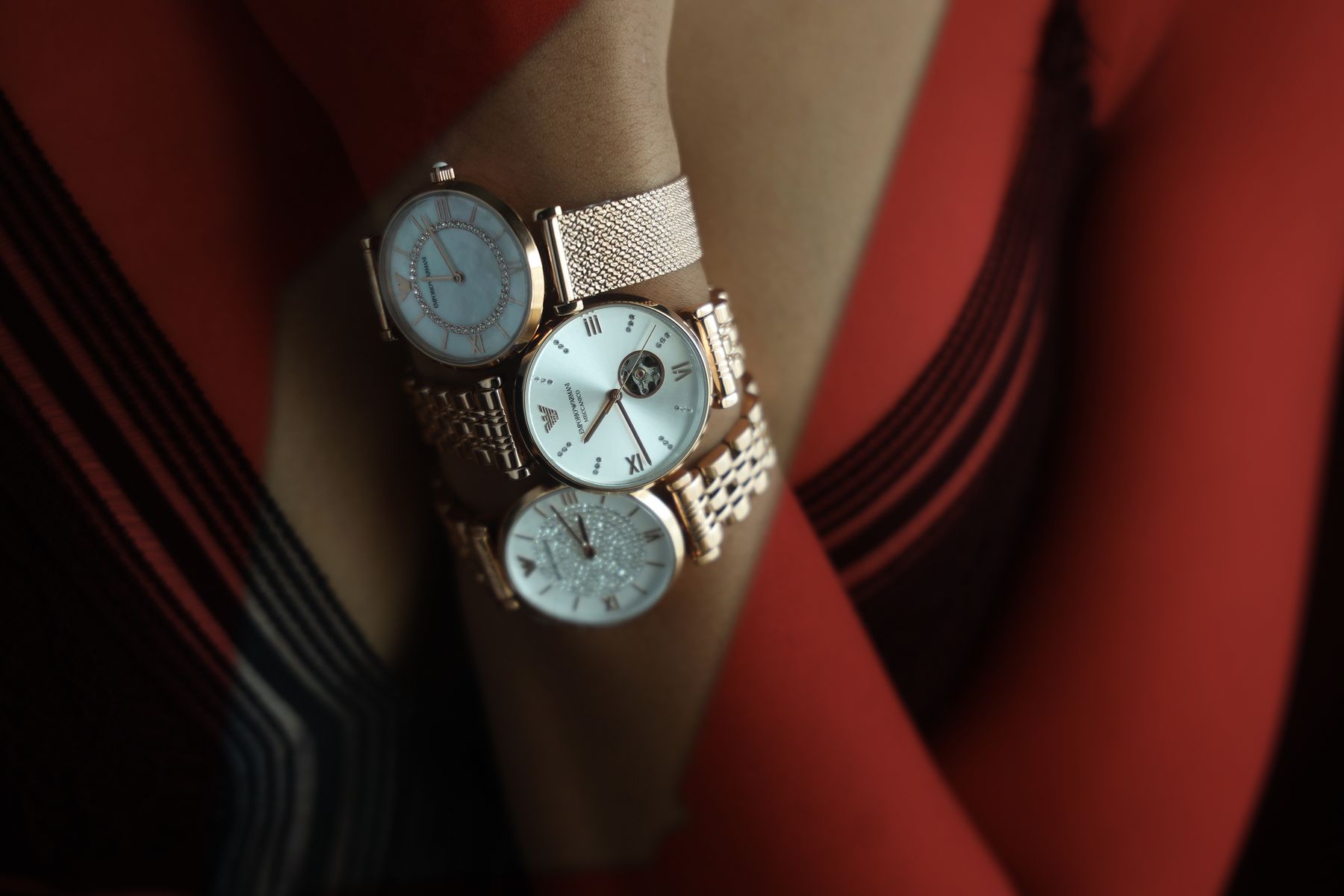 Gold watches on a wrist